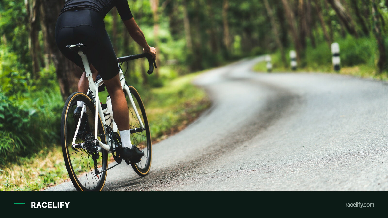 Cyclist grinding up a long climb