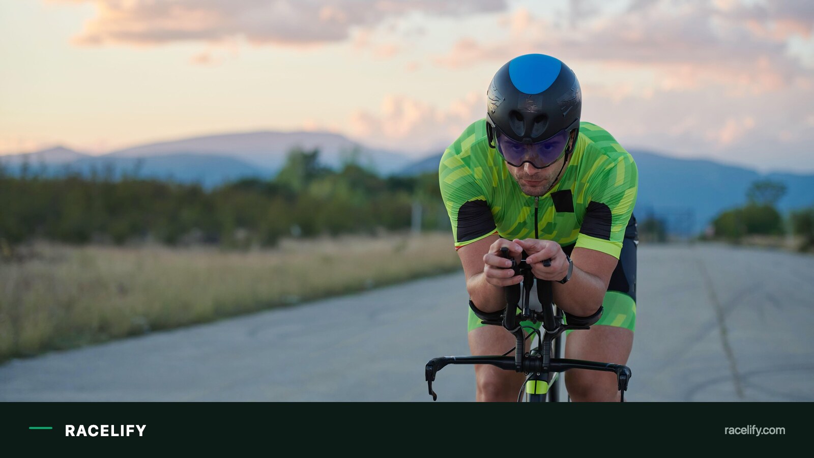 Rider held in an aero tuck on a time trial bike