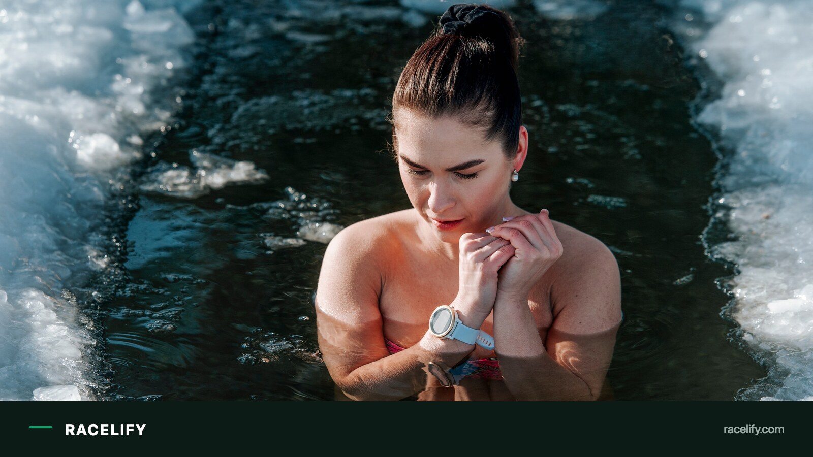 Athlete recovering in cold water after a long race