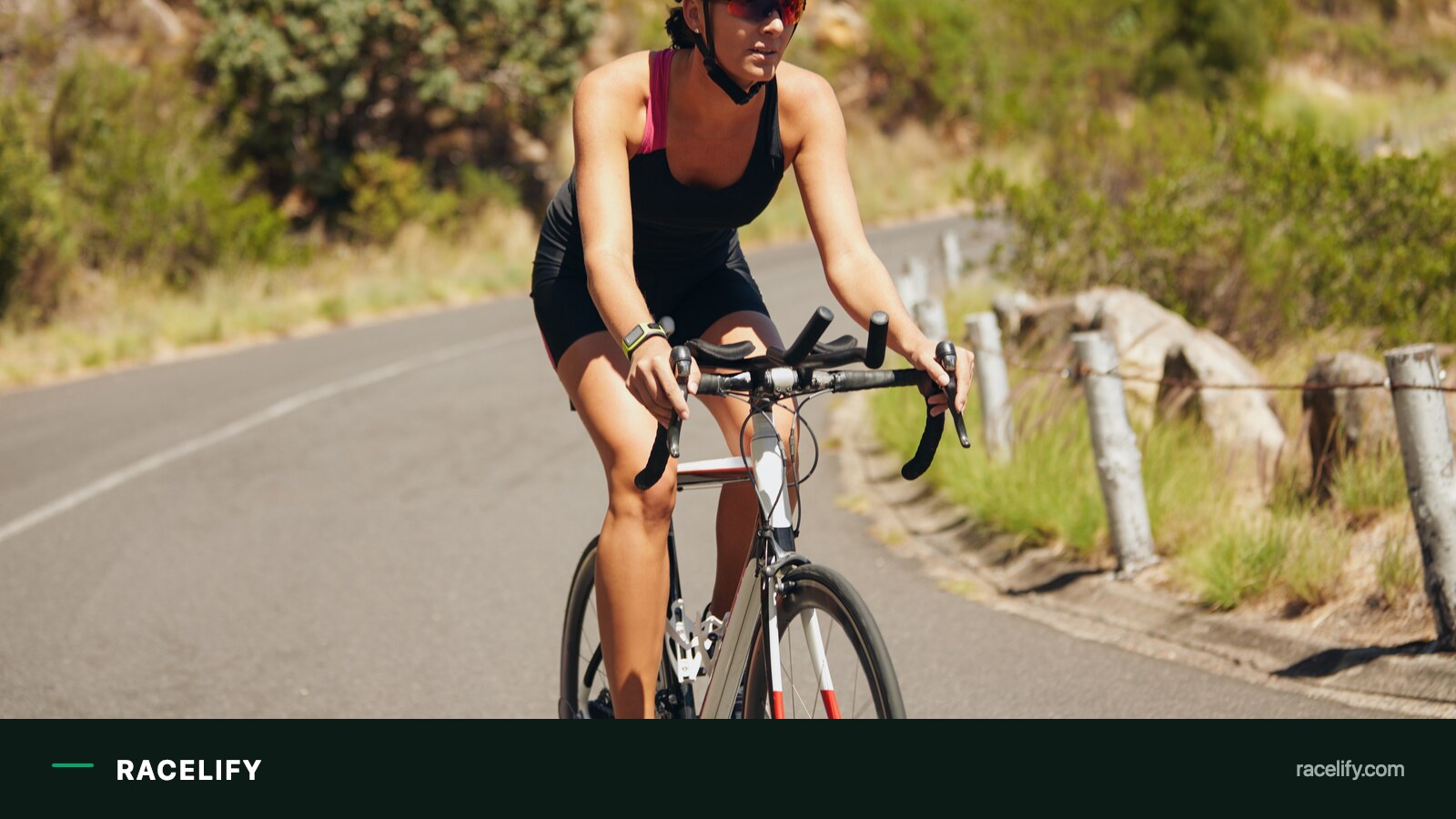 Triathlete alone on the bike leg of a long course race